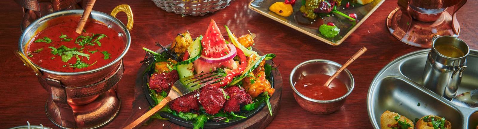 Indian dishes with naan, tandoori and curries
